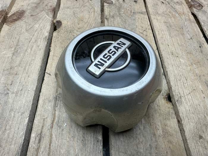 TAPACUBOS ORIGINAL NISSAN TERRANO - QrBox.es