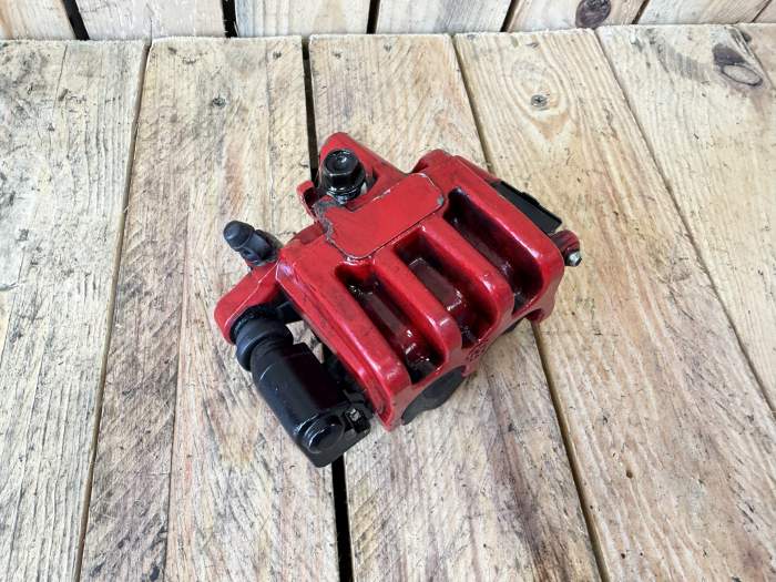 PINZA TRASERA KYMCO XCITING 500 09-12
