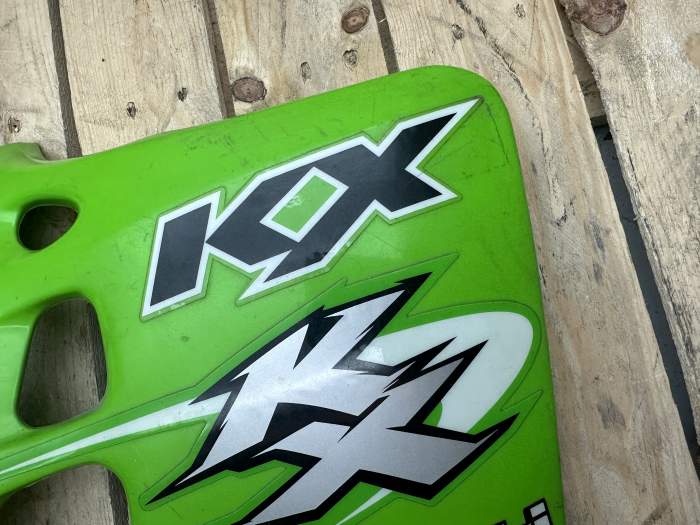 TAPA DEPOSITO DERECHA KX250 1990