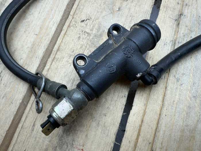 BOMBA DE FRENO TRASERO + LATIGUILLO APRILIA AF1